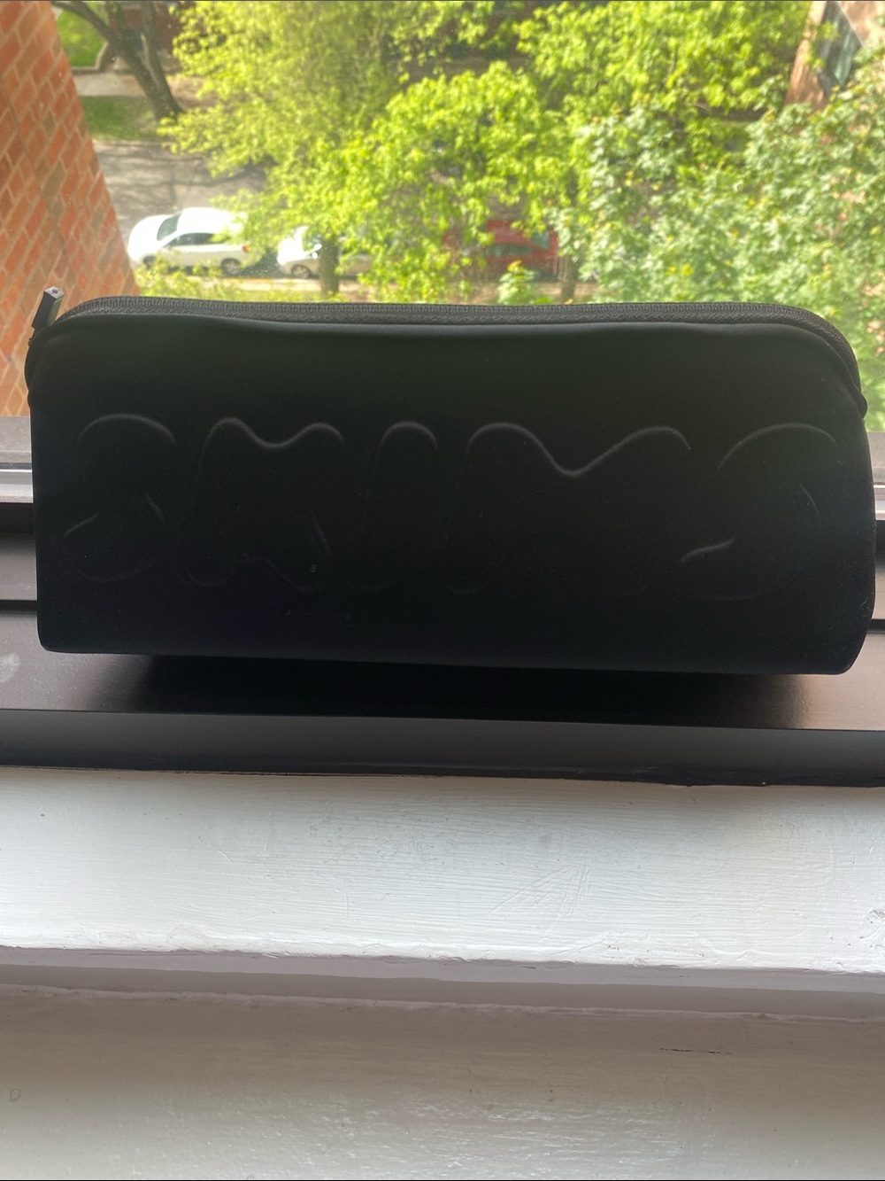 Black SKIMS Zipper Pouch